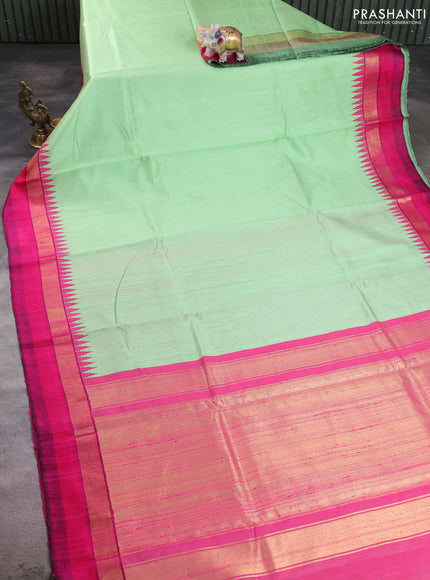 Pure dupion silk saree pista green and pink with plain body and temple design zari woven simple border
