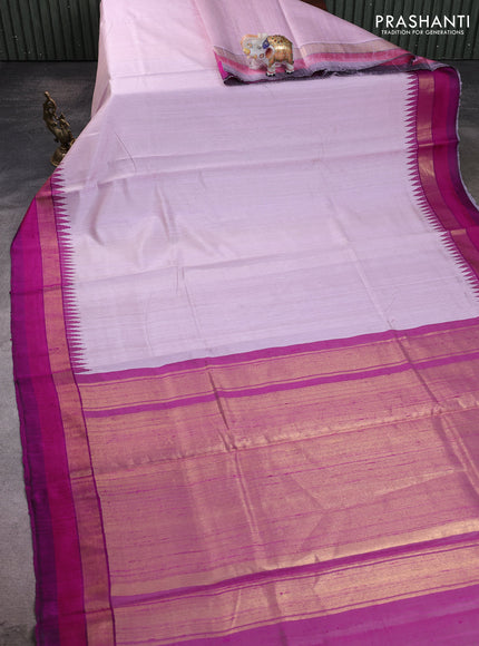 Pure dupion silk saree mild lavender and purple with plain body and temple design zari woven simple border