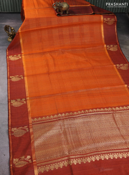 Pure dupion silk saree orange with allover zari checked pattern and rettapet zari woven butta border