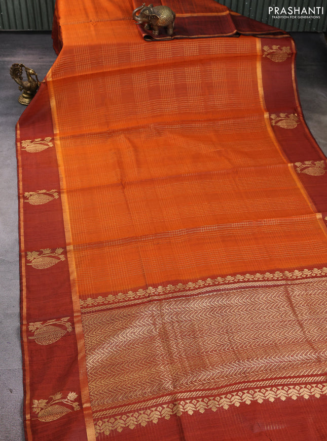 Pure dupion silk saree orange with allover zari checked pattern and rettapet zari woven butta border