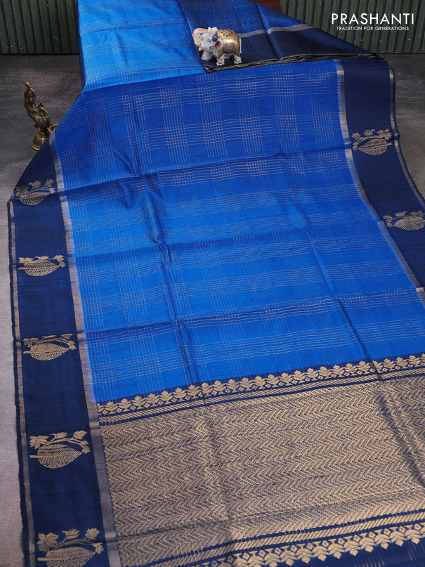 Pure dupion silk saree cs blue with allover zari checked pattern and rettapet zari woven butta border