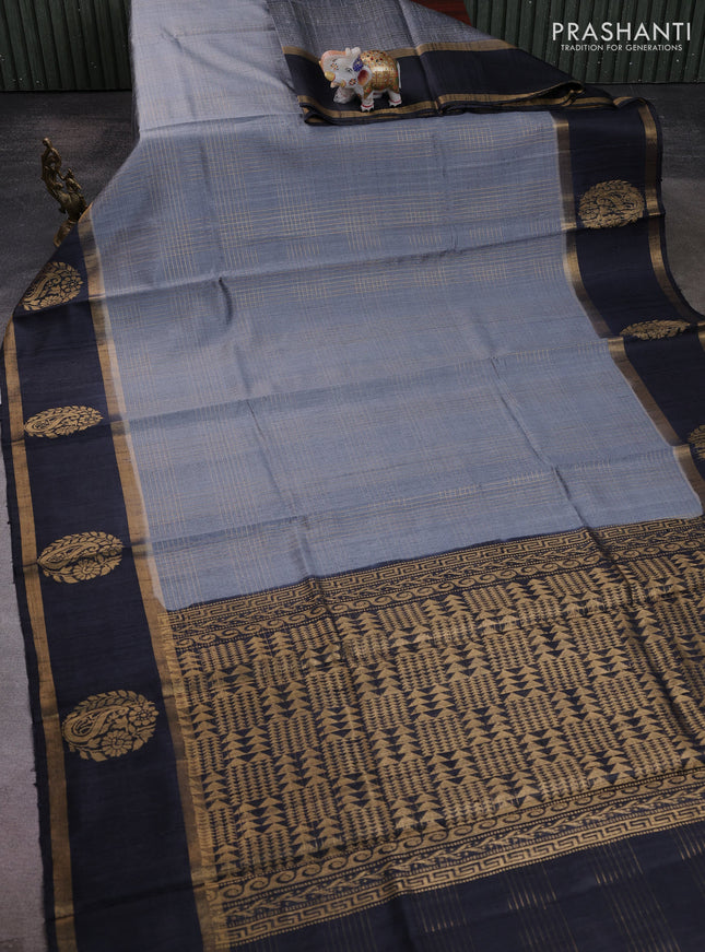 Pure dupion silk saree grey and navy blue with allover zari checked pattern and rettapet zari woven butta border