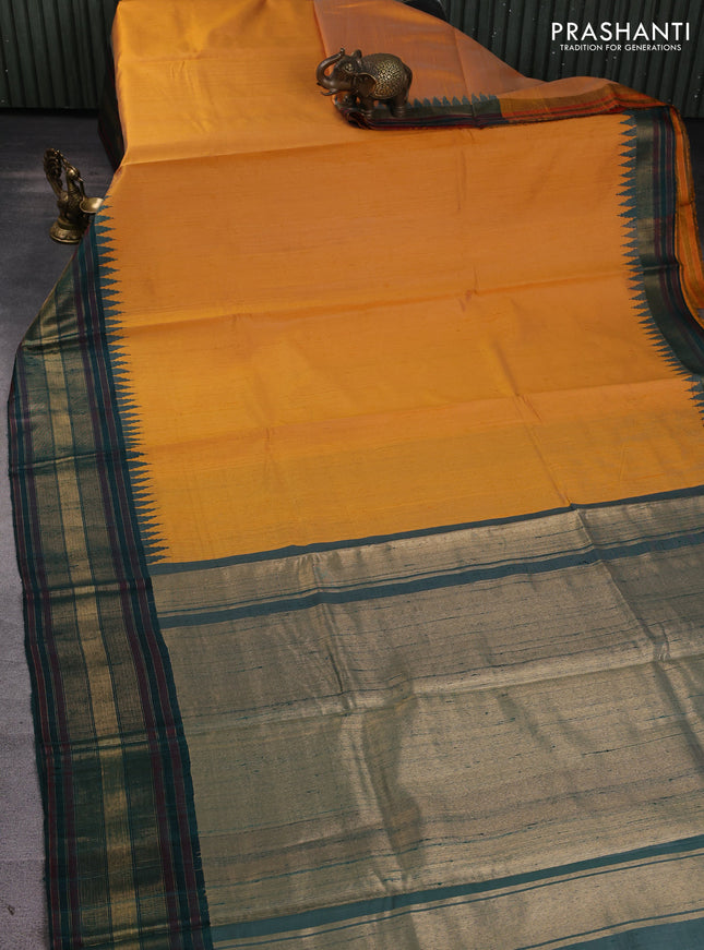 Pure dupion silk saree mustard yellow and peacock green with plain body and temple design zari woven border