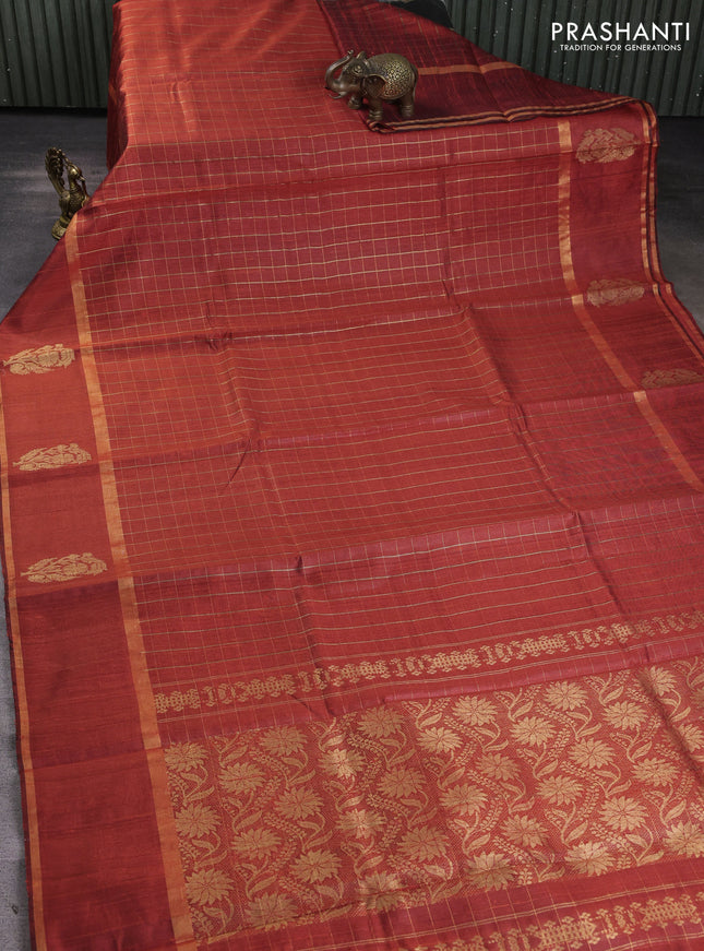 Pure dupion silk saree orange with allover zari checked pattern and rettapet zari woven butta border