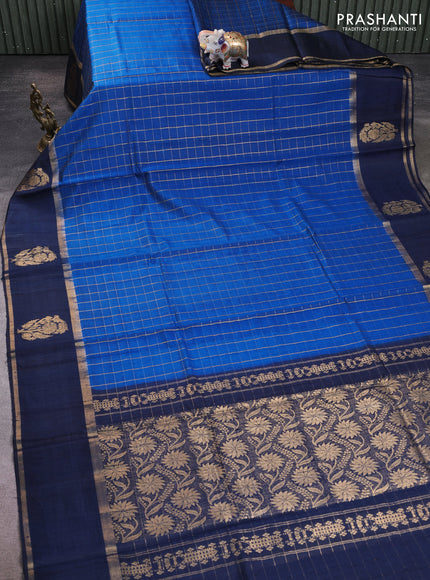 Pure dupion silk saree cs blue and navy blue with allover zari checked pattern and rettapet zari woven butta border