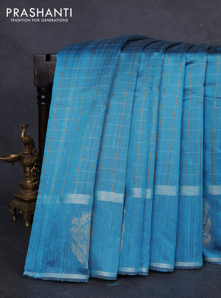 Pure dupion silk saree cs blue with allover zari checked pattern and rettapet zari woven butta border