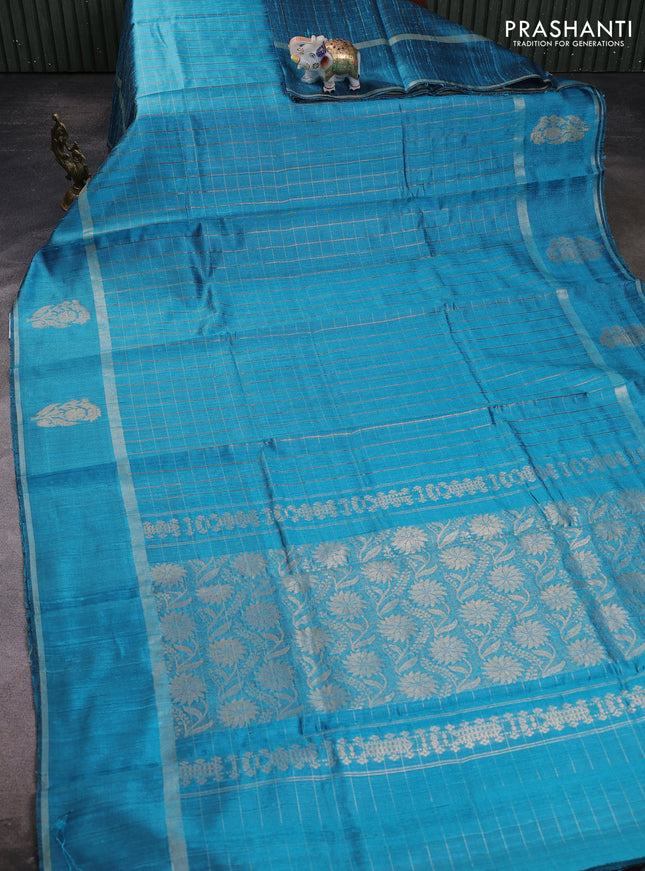 Pure dupion silk saree cs blue with allover zari checked pattern and rettapet zari woven butta border