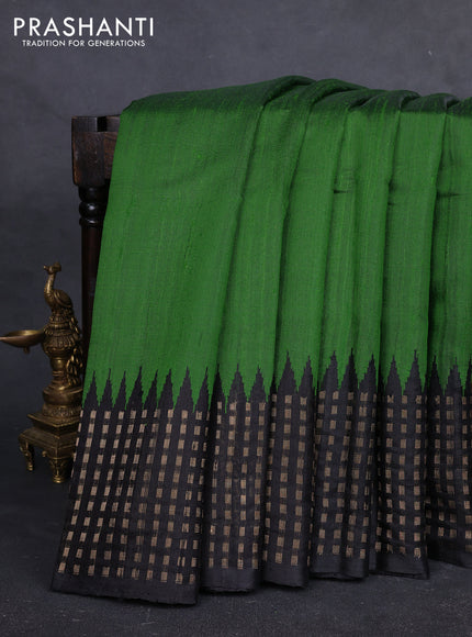 Pure dupion silk saree green and black with plain body and temple design zari woven butta border