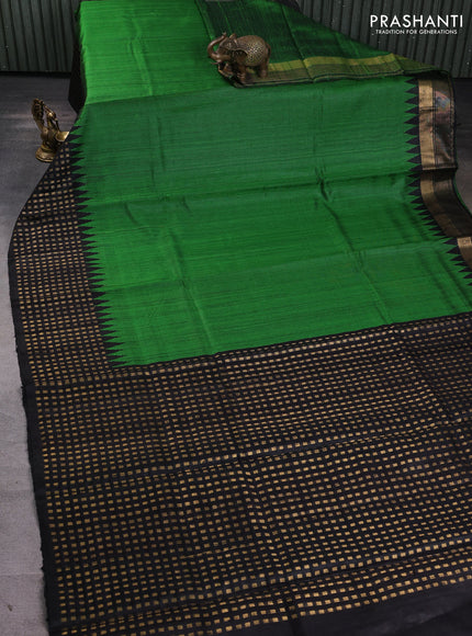 Pure dupion silk saree green and black with plain body and temple design zari woven butta border