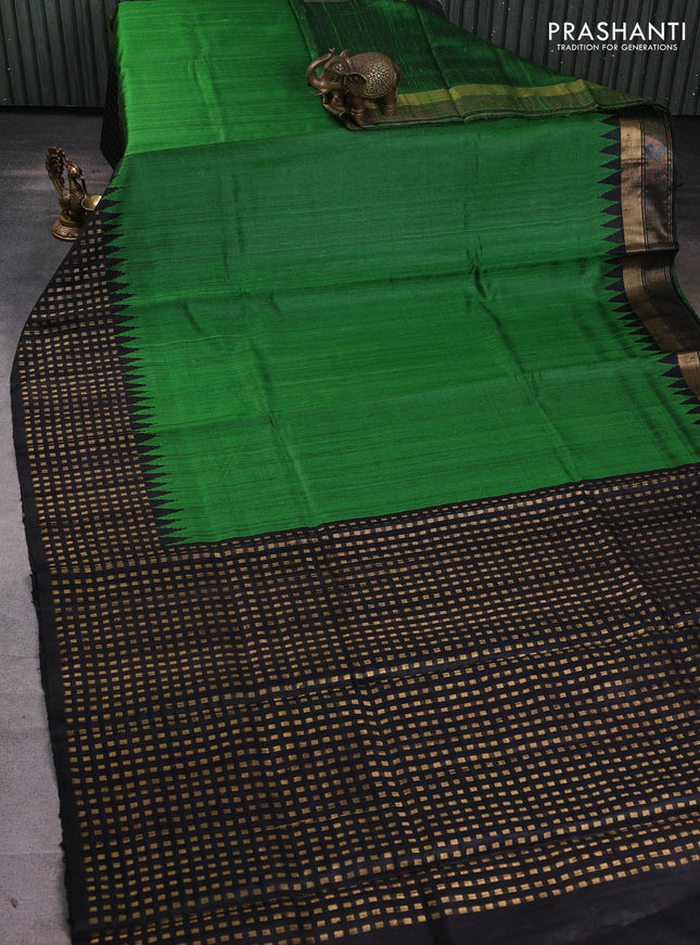 Pure dupion silk saree green and black with plain body and temple design zari woven butta border