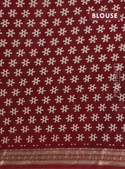 Muslin silk saree deep violet and maroon with allover pichwai prints and zari woven border