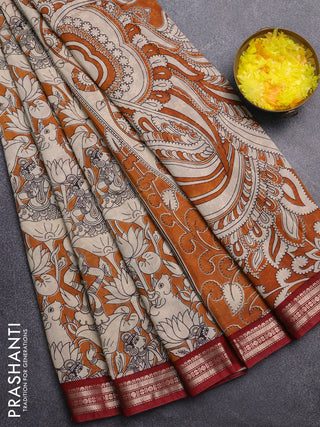 Muslin silk saree dark mustard and maroon with allover pichwai prints and zari woven border