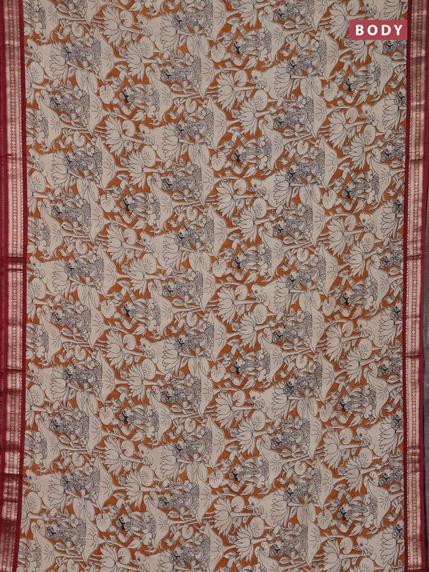 Muslin silk saree dark mustard and maroon with allover pichwai prints and zari woven border