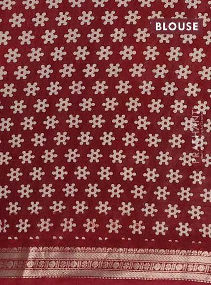 Muslin silk saree dark mustard and maroon with allover pichwai prints and zari woven border