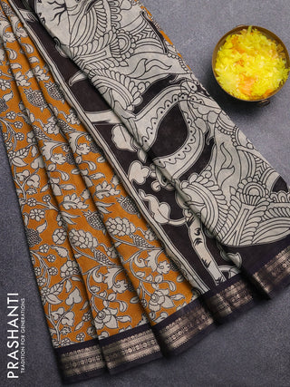 Muslin silk saree mustard yellow and black with allover kalamkari prints and zari woven border