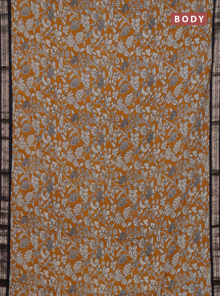 Muslin silk saree mustard yellow and black with allover kalamkari prints and zari woven border