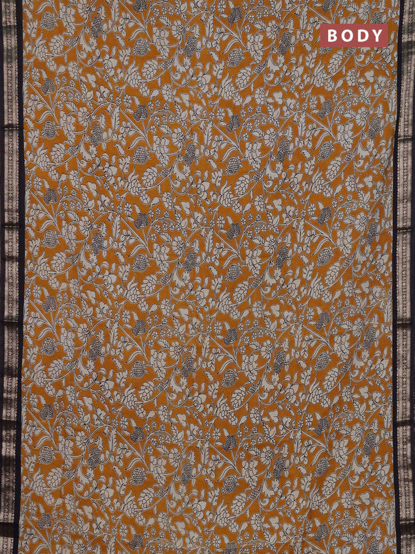 Muslin silk saree mustard yellow and black with allover kalamkari prints and zari woven border