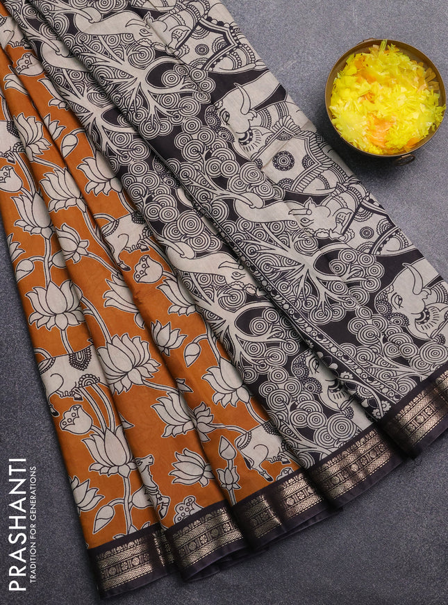 Muslin silk saree dark mustard and black with allover pichwai prints and zari woven border