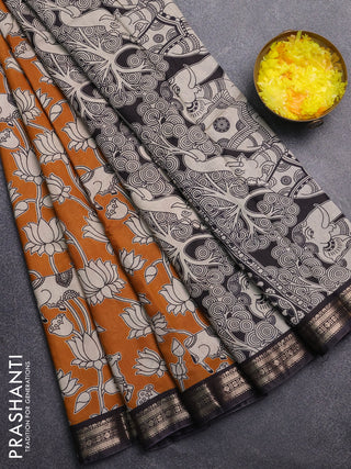 Muslin silk saree dark mustard and black with allover pichwai prints and zari woven border