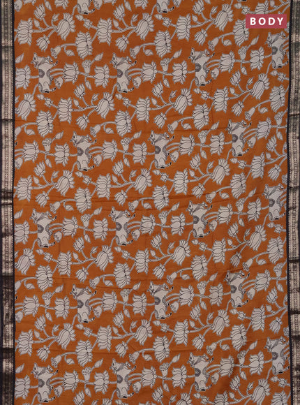 Muslin silk saree dark mustard and black with allover pichwai prints and zari woven border