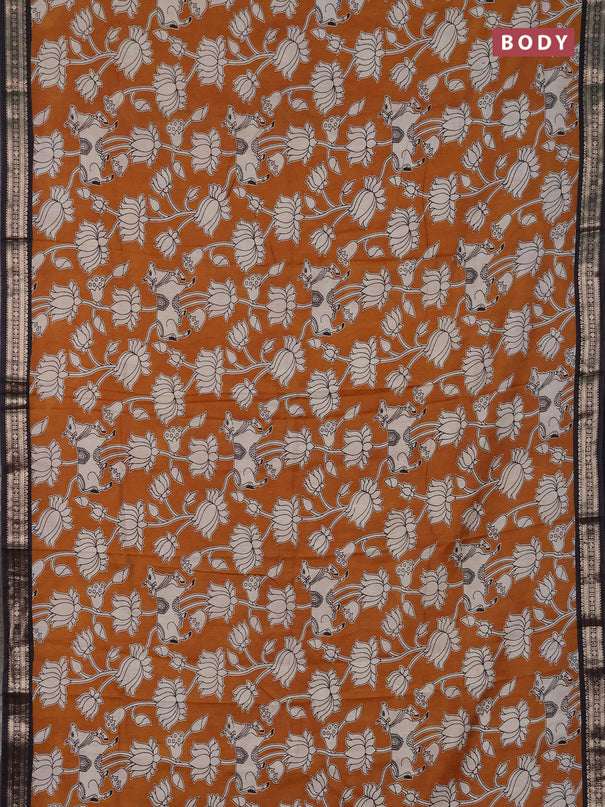Muslin silk saree dark mustard and black with allover pichwai prints and zari woven border