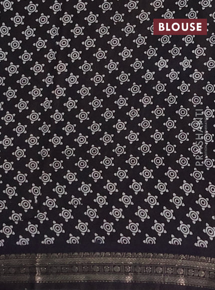 Muslin silk saree dark mustard and black with allover pichwai prints and zari woven border