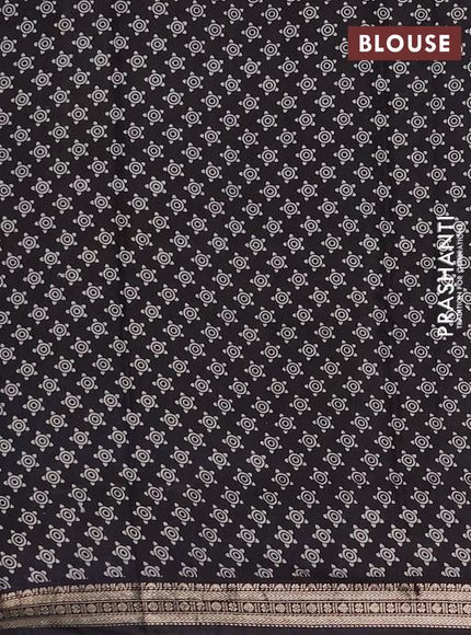 Muslin silk saree deep maroon and black with allover pichwai prints and zari woven border