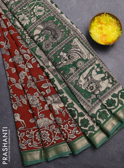 Muslin silk saree rust shade and green with allover kalamkari prints and zari woven border