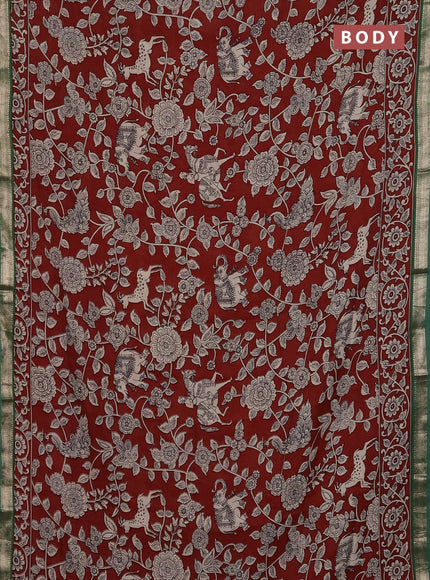 Muslin silk saree rust shade and green with allover kalamkari prints and zari woven border