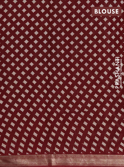 Muslin silk saree deep jamun and maroon with allover kalamkari prints and zari woven border