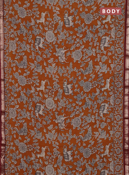 Muslin silk saree dark mustard and maroon with allover kalamkari prints and zari woven border