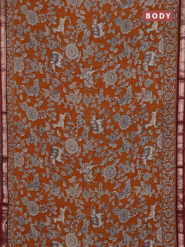 Muslin silk saree dark mustard and maroon with allover kalamkari prints and zari woven border