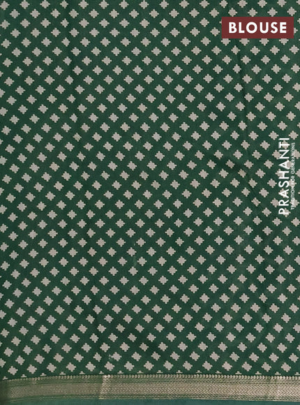 Muslin silk saree deep wine and green with allover kalamkari prints and zari woven border