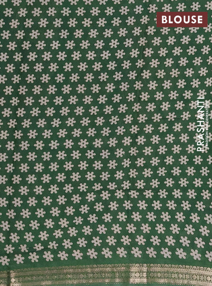 Muslin silk saree deep jamun and green with allover kalamkari prints and zari woven border