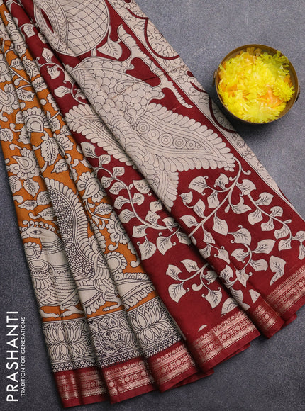Muslin silk saree dark mustard and maroon with allover kalamkari prints and zari woven border