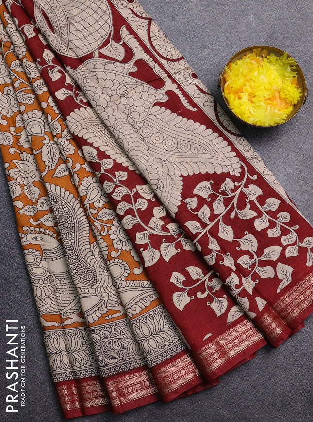 Muslin silk saree dark mustard and maroon with allover kalamkari prints and zari woven border