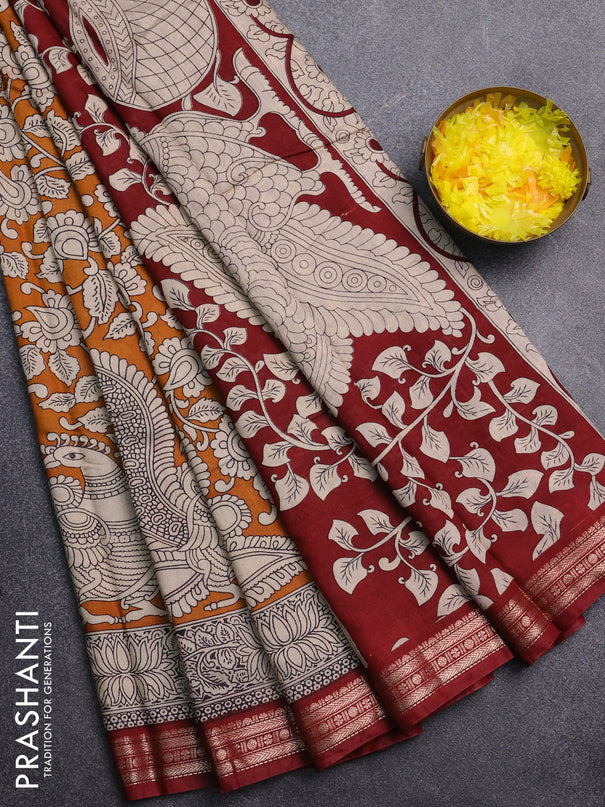 Muslin silk saree dark mustard and maroon with allover kalamkari prints and zari woven border