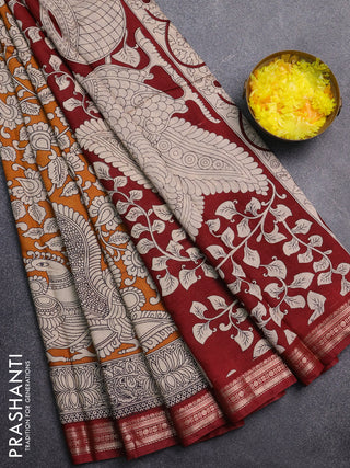 Muslin silk saree dark mustard and maroon with allover kalamkari prints and zari woven border