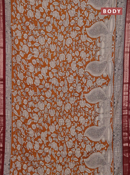 Muslin silk saree dark mustard and maroon with allover kalamkari prints and zari woven border