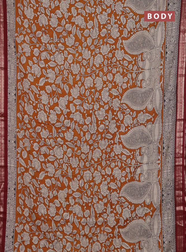 Muslin silk saree dark mustard and maroon with allover kalamkari prints and zari woven border