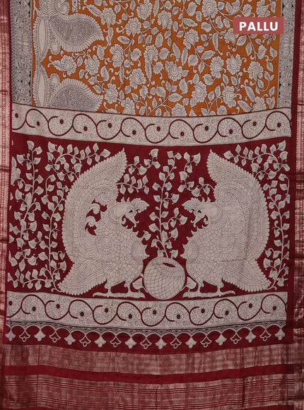 Muslin silk saree dark mustard and maroon with allover kalamkari prints and zari woven border