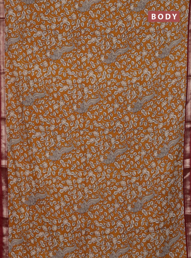 Muslin silk saree mustard yellow and maroon with allover kalamkari prints and zari woven border