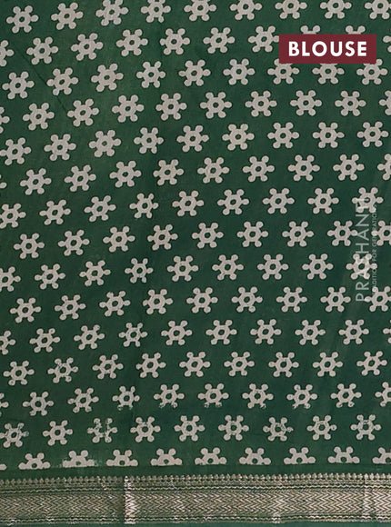 Muslin silk saree wine shade and green with allover kalamkari prints and zari woven border