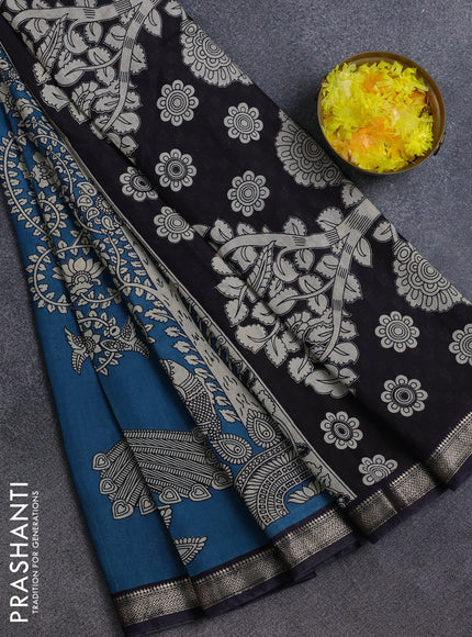Muslin silk saree cs blue and black with allover kalamkari prints and zari woven border