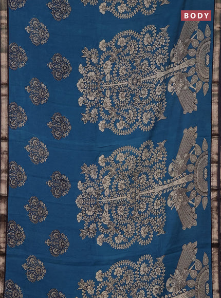 Muslin silk saree cs blue and black with allover kalamkari prints and zari woven border