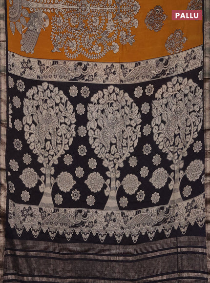 Muslin silk saree dark mustard and black with allover kalamkari prints and zari woven border