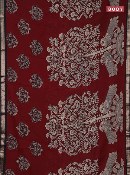 Muslin silk saree rust shade and black with allover kalamkari prints and zari woven border