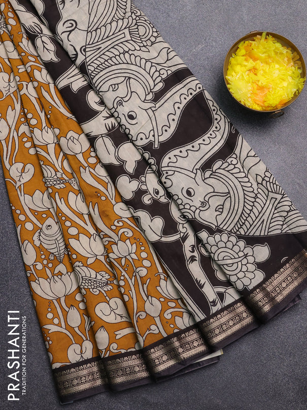 Muslin silk saree mustard yellow and black with allover kalamkari prints and zari woven border
