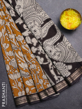Muslin silk saree mustard yellow and black with allover kalamkari prints and zari woven border