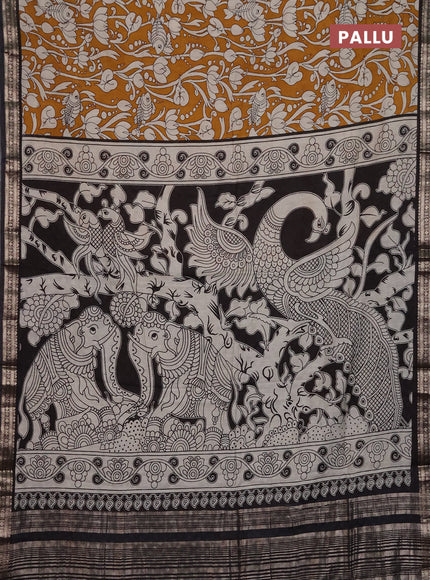 Muslin silk saree mustard yellow and black with allover kalamkari prints and zari woven border
